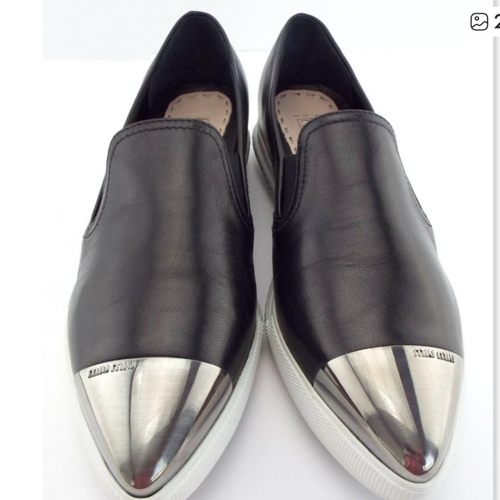 Miu Miu Black Authentic Leather Slip-Ons with Silver Toe Caps